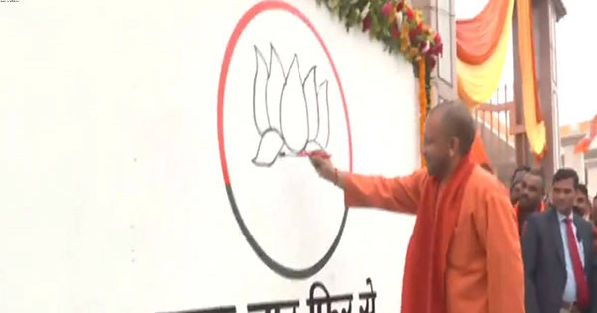 UP CM Yogi Adityanath participates in BJP's 'Ek Baar Phir Se Modi Sarkar' wall writing campaign